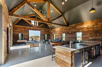 'The red barn' games lounge with foosball, shuffleboard, and table tennis